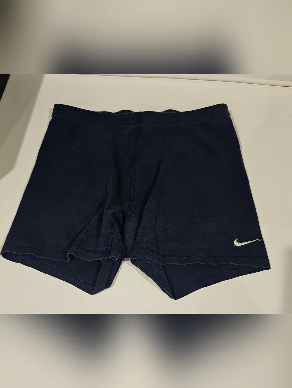 Nike Navy Blue Performance Shorts with White Swoosh